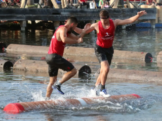 Log rolling is a traditional sport that originated in North America, popular among loggers who used it as a way to test their balance and agility
