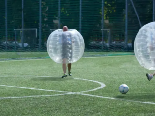 Bubble football is a humorous and action-packed sport where players wear inflatable suits and bounce, bump, and tumble their way through a chaotic game of soccer