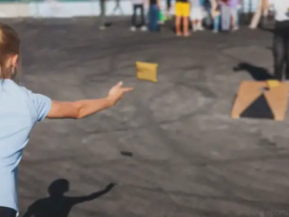 Cornhole is an exciting and competitive tossing game where players aim bean bags at a raised board, striving for precision shots and dramatic comebacks